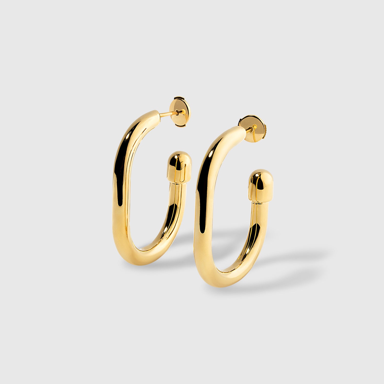 "Extrusion" Thin Large Gold Hoop Earrings